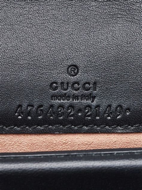 gucci serial number tag font